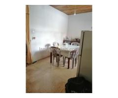 CALM HOUSE NEAR KARAPITIYA TOWN WITH LARGE GARDEN AND LIVING ROOM FOR RENT IN HIRIMBURA ROAD.